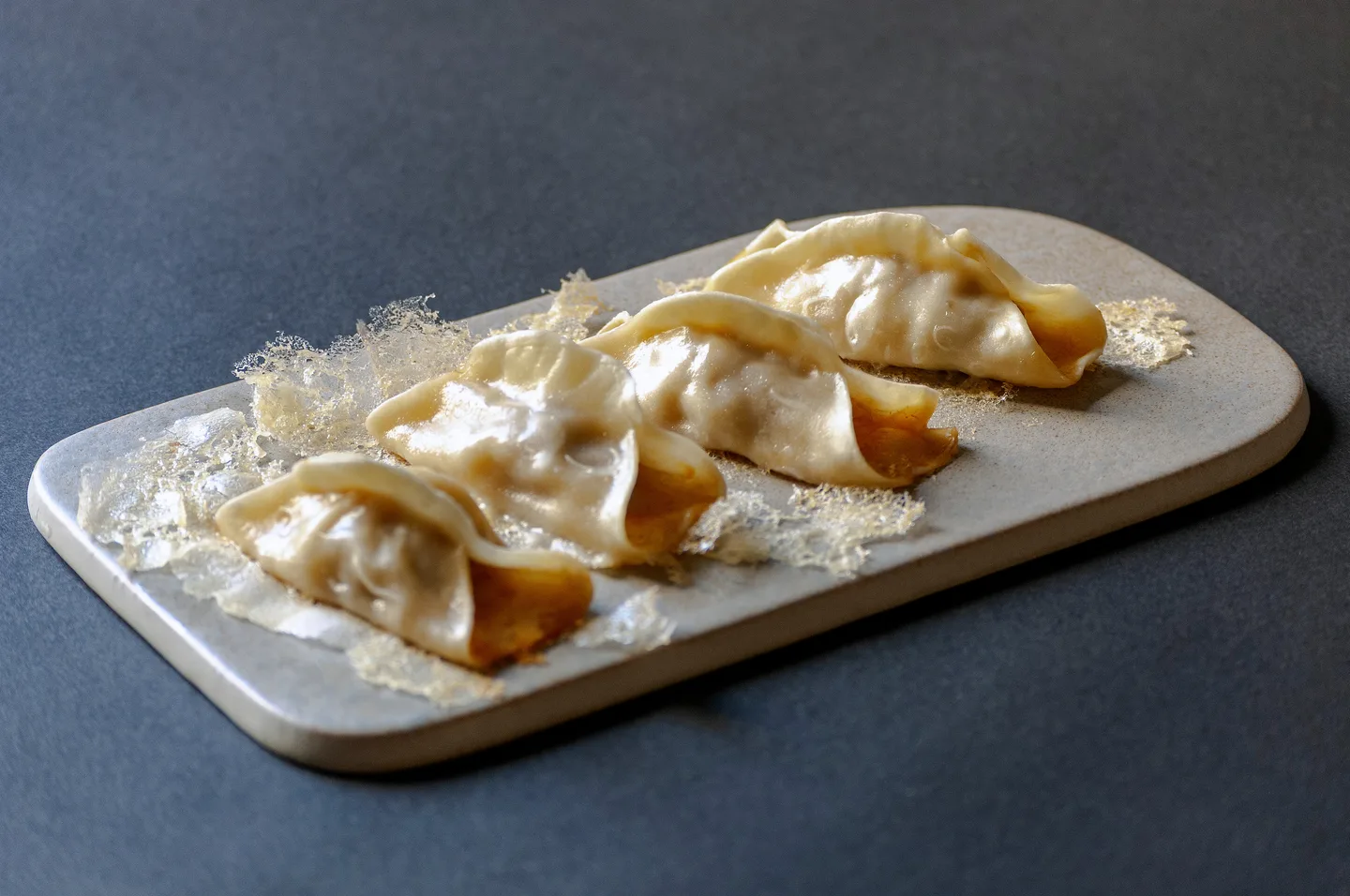 Guotie - ravioli di carne di suino alla griglia
